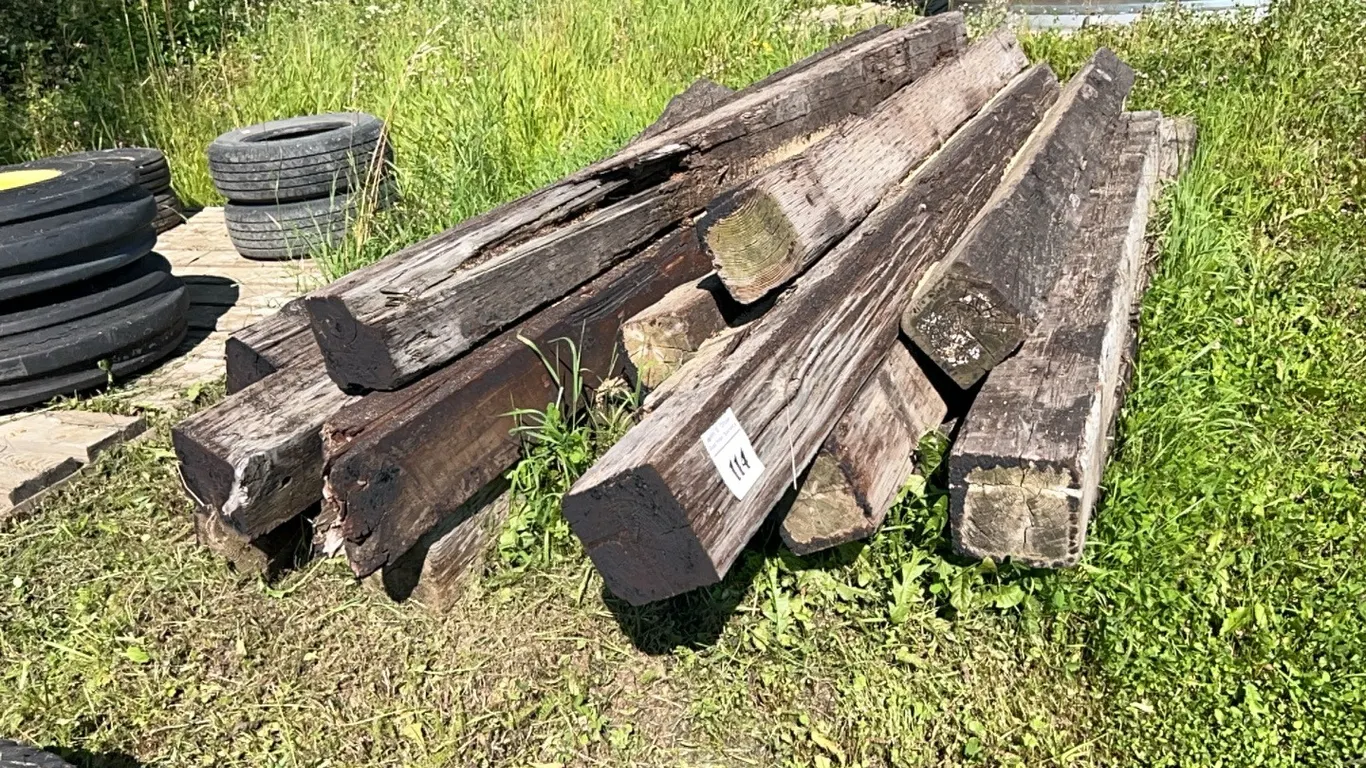 PILE OF ASSORTED TREATED TIMBERS