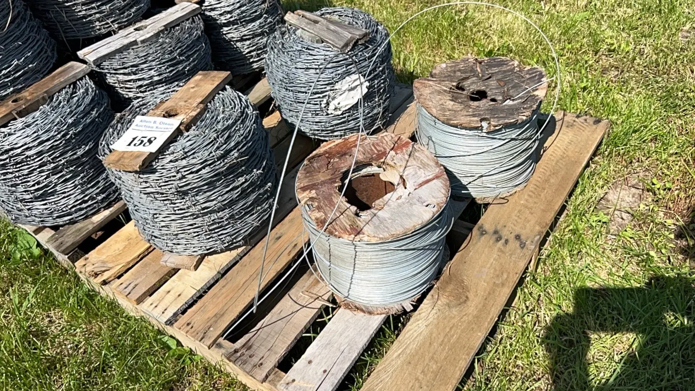 2 - ROLLS NEW/UNUSED DOUBLE STRAND BARB WIRE & 2 - ROLLS HIGH TENSILE SMOOTH WIRE