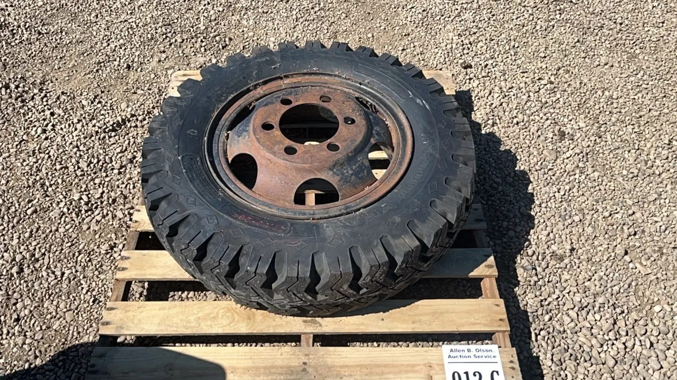 GOODYEAR 7.50 - 20 TIRE ON DODGE 6 BOLT RIM