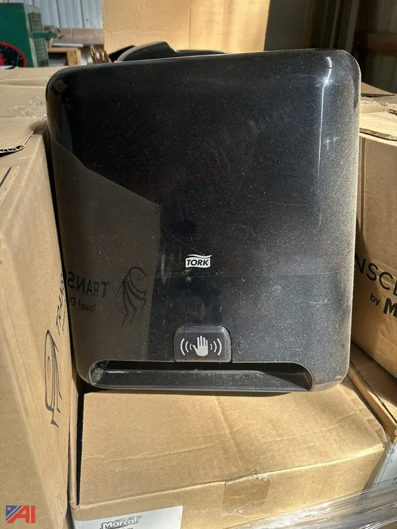 Pallet of Paper Towel and Toilet Paper Dispensers