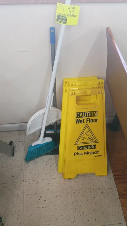 Janitorial supply lot. Includes (4) Impact yellow folding caution wet floor signs, an upright lobby dustpan, and a broom.