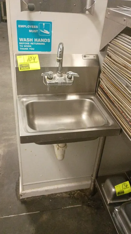 John Boos stainless steel wall-mount hand wash sink. Features a splash-mount gooseneck faucet, single basin, and integrated backsplash. 17" x 15" x 10