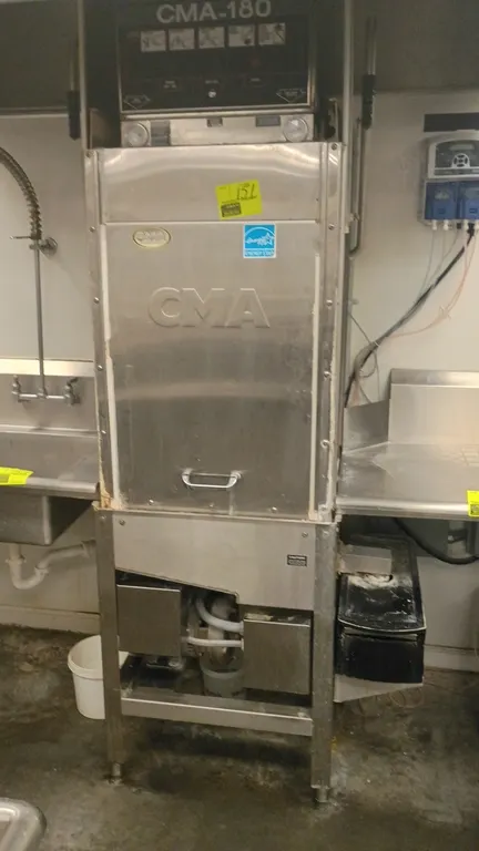 CMA CMA-180 door-type dishwasher. Features stainless steel construction, 3-door lift design, top-mounted control panel, and rotating wash and rinse ar