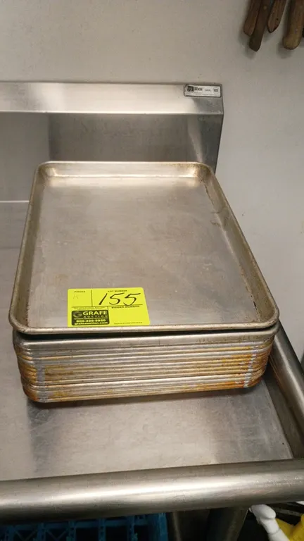Aluminum baking sheet pans. Features aluminum construction with rolled wire rims.