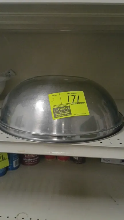 Stainless steel mixing bowls. Features stainless steel construction with rolled rims. Includes (2) nested bowls.