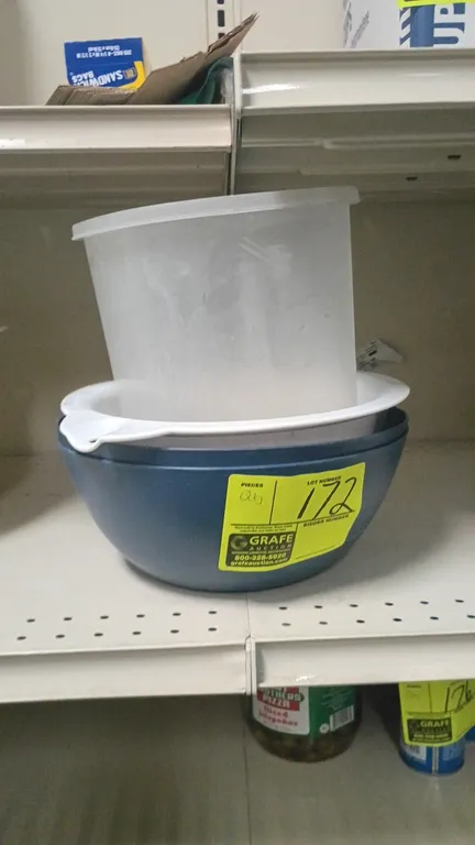 Plastic food prep assortment. Includes poly mixing bowls, colander strainer, and round food storage container with lid.