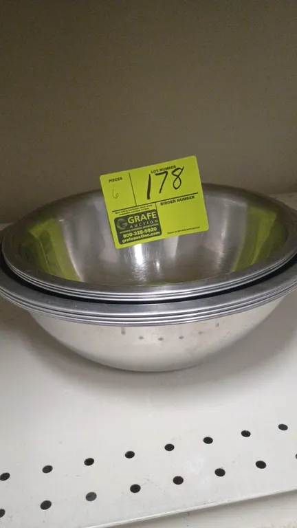 Stainless steel mixing bowls. Features durable stainless steel construction with rolled rims and nesting design.