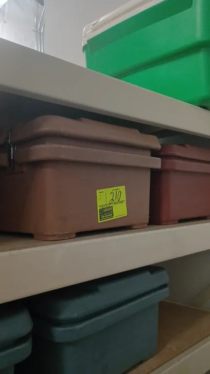 Cambro insulated food pan carriers. Features top-loading design with latched lids and molded-in handles. Molded polyethylene construction.