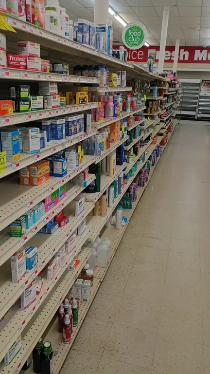 96'L of Lozier gondola shelving. Features 72"H uprights, 22" x 22" base decks, and adjustable upper shelves. Contents not included. Note: Gondola shel