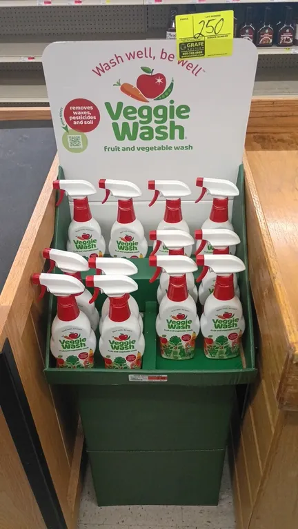 Veggie Wash fruit and vegetable wash retail display. Includes 16 fl oz spray bottles and branded cardboard floor display stand.
