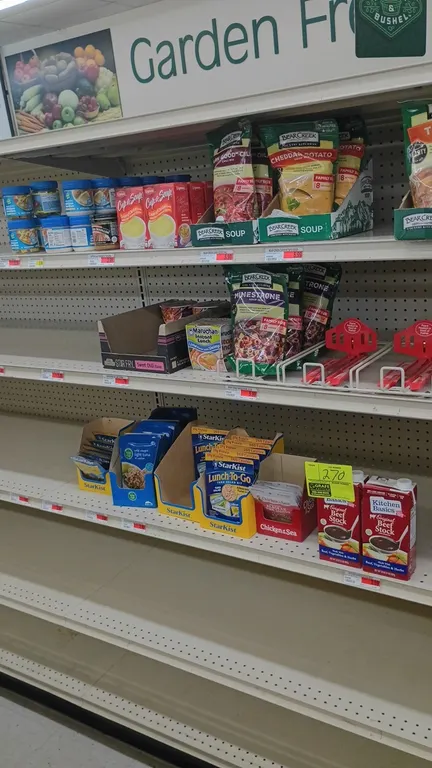 Assorted retail grocery inventory from 4' shelving section. Includes Kitchen Basics beef stock, StarKist tuna pouches and meal kits, Chicken of the Se