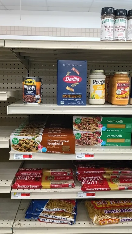 Contents of 4' shelving section. Includes assorted dry pasta, egg noodles, Alfredo sauce, Cheez Whiz, cheese dip, pasta sauces, pesto, canned beans, a