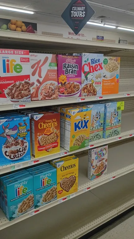 Assorted boxed cereal inventory from a 4' section. Brands include General Mills, Kellogg's, Quaker, and Food Club. Features varieties such as Cheerios