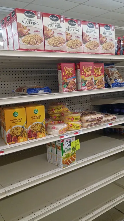 Contents of 4' shelving section. Includes assorted dry grocery products including Mrs. Cubbison's, Stove Top, and Food Club stuffing mixes, Pepperidge
