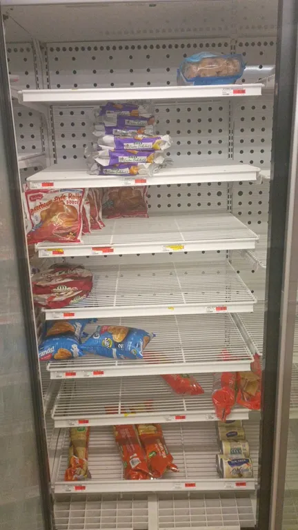Assorted frozen food inventory from (5) freezer door sections. Includes packaged frozen breakfast items, waffles, pancakes, rolls, dough, breakfast sa