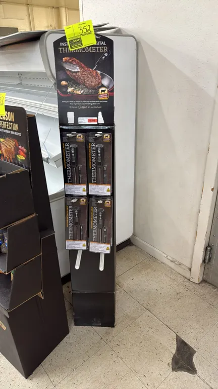 Certified Angus Beef digital waterproof meat thermometers. Lot includes (11) individually packaged thermometers with cardboard retail display stand. F
