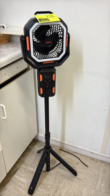 Ogery cordless pedestal fan. Features integrated LED ring light, multi-angle oscillation, timer settings, variable speed control dial, USB charging po