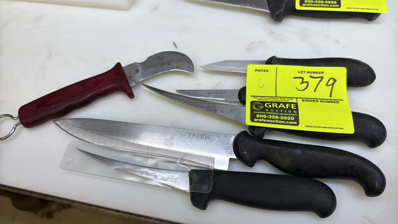 Assorted kitchen and butcher knives. Includes various styles such as boning, curved skinning, paring, and chef knives by makers including Oneida, Vict