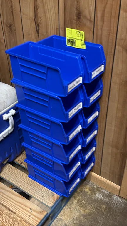 Blue polypropylene stackable storage bins. Features open-hopper fronts with label slots. 10.5"L.