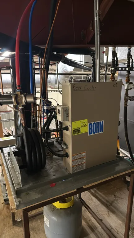 Bohn HWN008X6BSP medium-temp condensing unit. Features a Copeland RST55C1E-CAV-211 compressor, electrical control box, and filter drier. Compressor S/