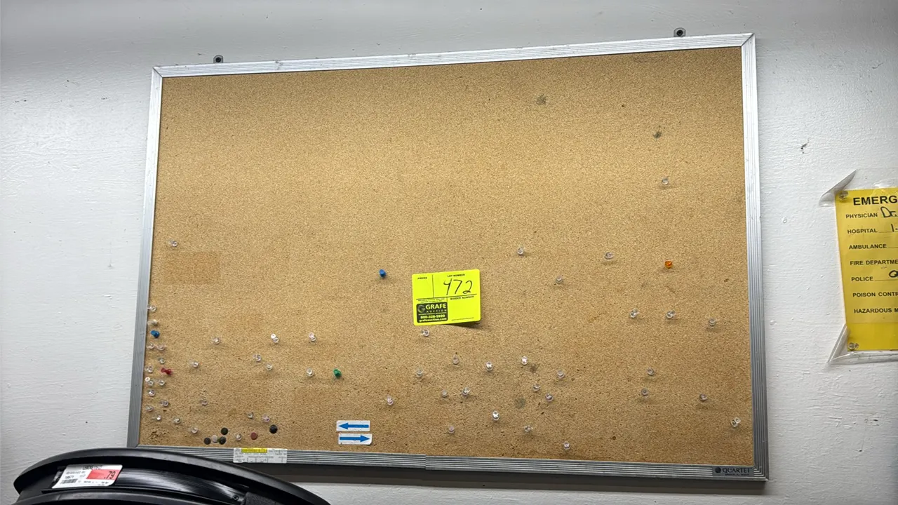 Quartet cork bulletin board. Features an aluminum frame. 3' x 2'.
