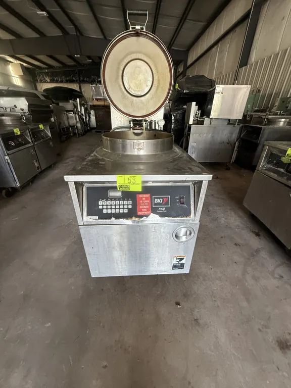 2004 BKI FKM-FC commercial pressure fryer. Features stainless steel construction, digital keypad controls, locking lid mechanism with pressure gauge,