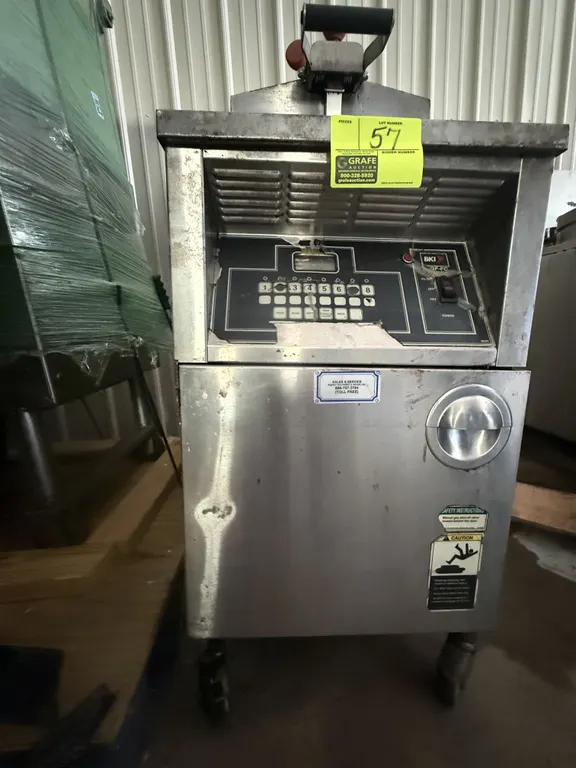 2007 BKI LGF-FC commercial pressure fryer. Features stainless steel construction and digital control keypad. S/N: 134876. Gas Type: Natural Gas, 90,00