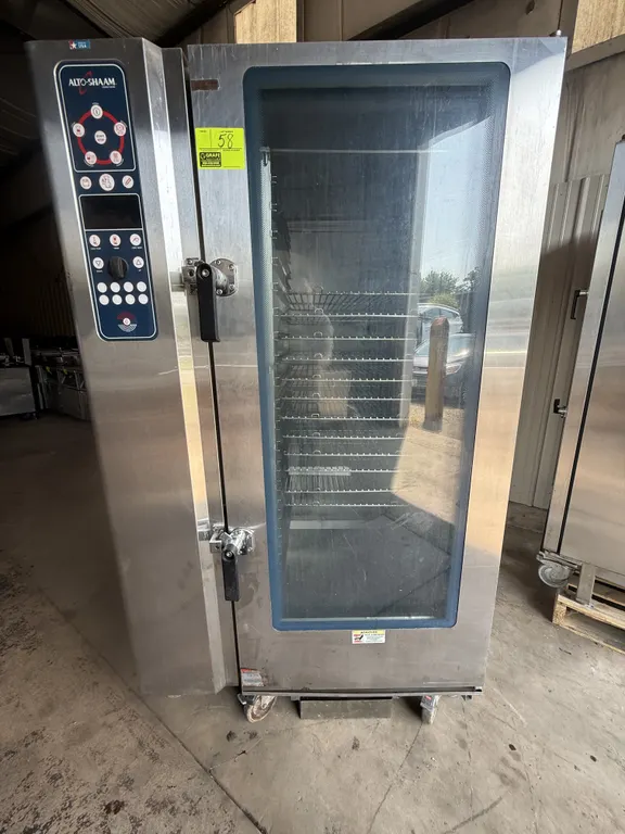 Alto-Shaam 20.20ML Combitherm electric combi oven. Features stainless steel construction, digital control panel, glass door, interior roll-in rack wit