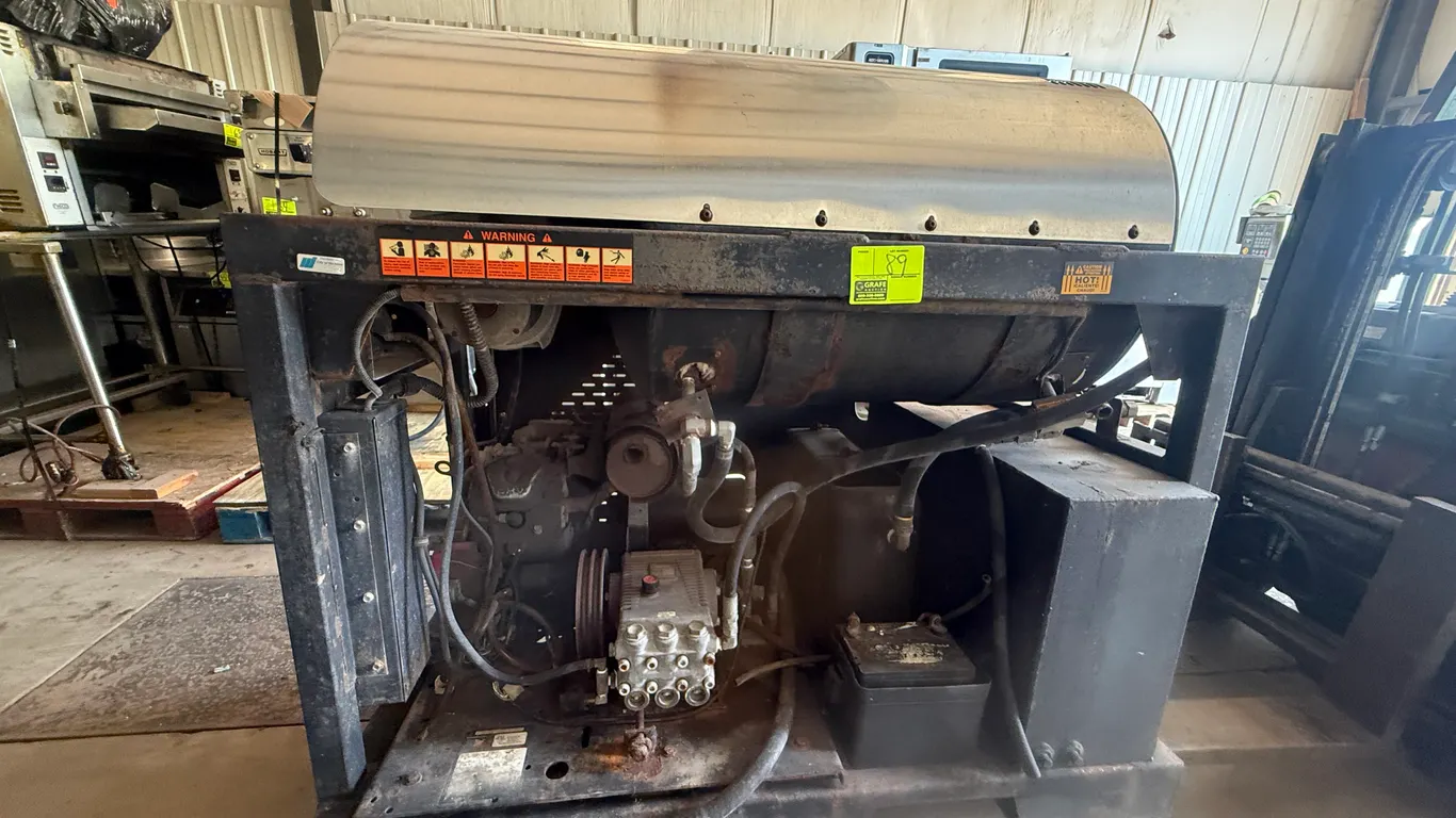 Landa SLT6-32324E hot water pressure washer. Features Beckett burner, detergent valve, steam valve, and steel skid frame. Specs: 3,200 PSI, 5.9 GPM, 2