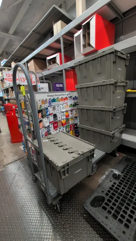 Metal 6-wheel U-boat platform cart. Features a diamond plate deck and dual tubular steel upright handles. 5'L. Mounted on 6 casters. Contents not incl