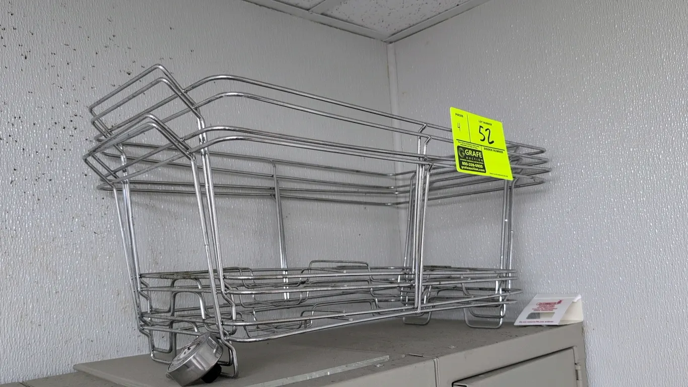 Metal wire chafing pan holders. Features chrome-plated wire construction, integrated side carry handles, and built-in fuel can holders. Stackable desi