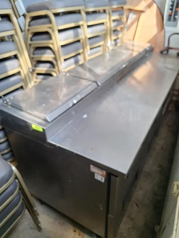 True 93" Refrigerated Pizza Prep Table on Wheels