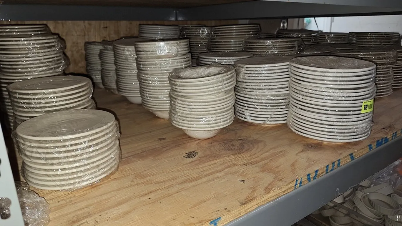 Assorted Small Plates on Shelf