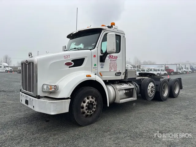 2018 Peterbilt 567 8x4 Tri/A Day Cab Truck Tractor