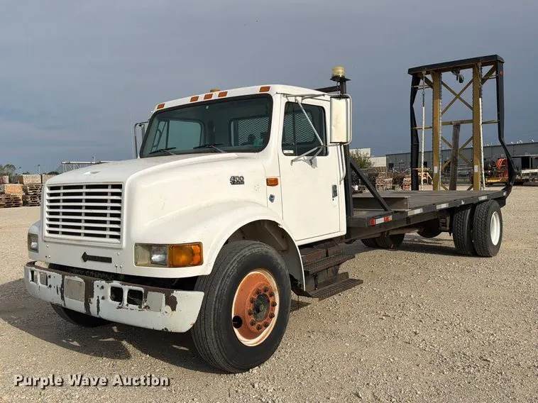1998 International 4700 flatbed truck with crash attenuator