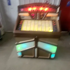 Rowe-AMI R-84 Jukebox, Illuminated, with Coin Slot and Selection Buttons lights up and works