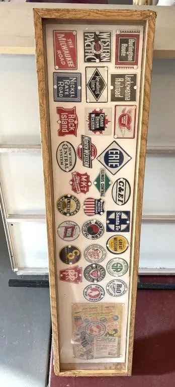 Metal Railroad Emblem Collection In Display
