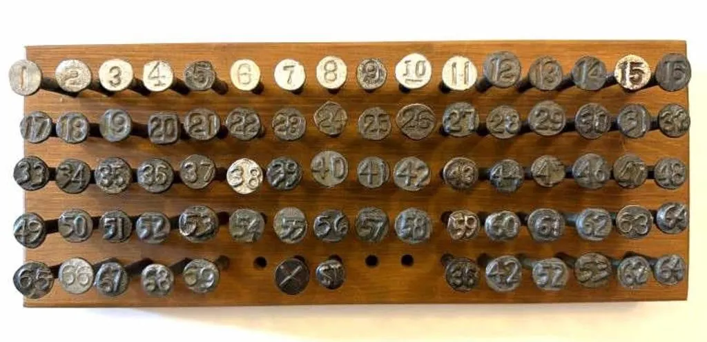 Railroad Date Nails in Wood Board
- board is