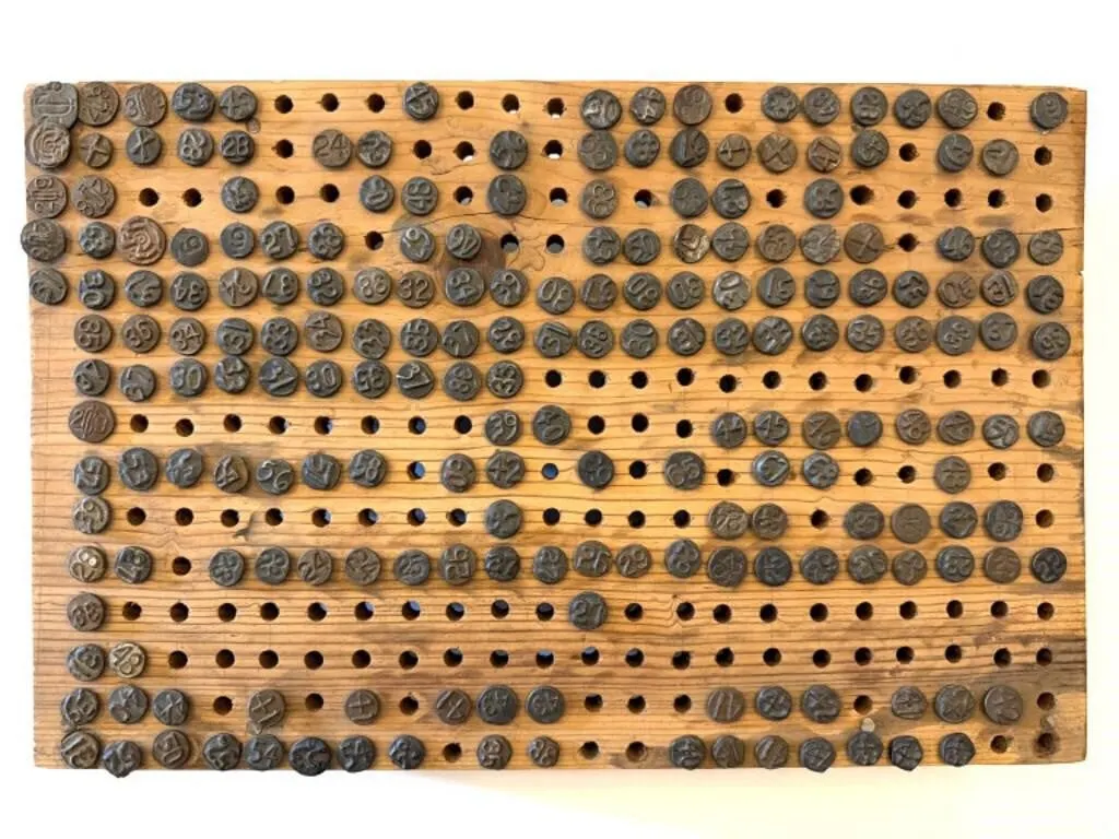 Railroad Date Nails in Wood Board
- board is