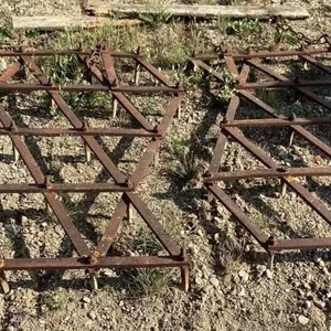 Two diamond harrows with hitch