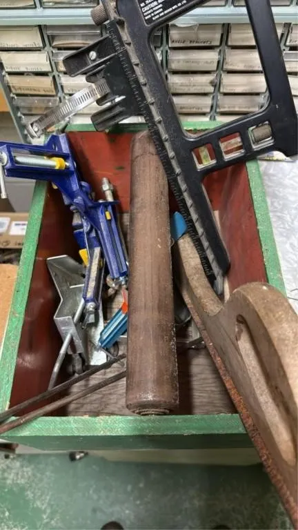 Assorted tools on wooden box
