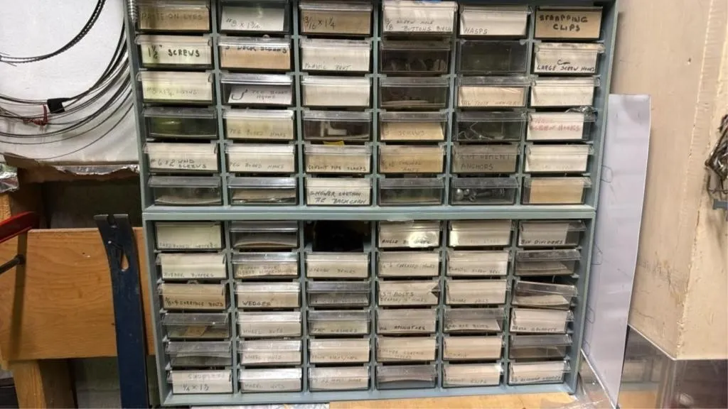 Assorted screws, hooks, bolts, wedges, clamps and