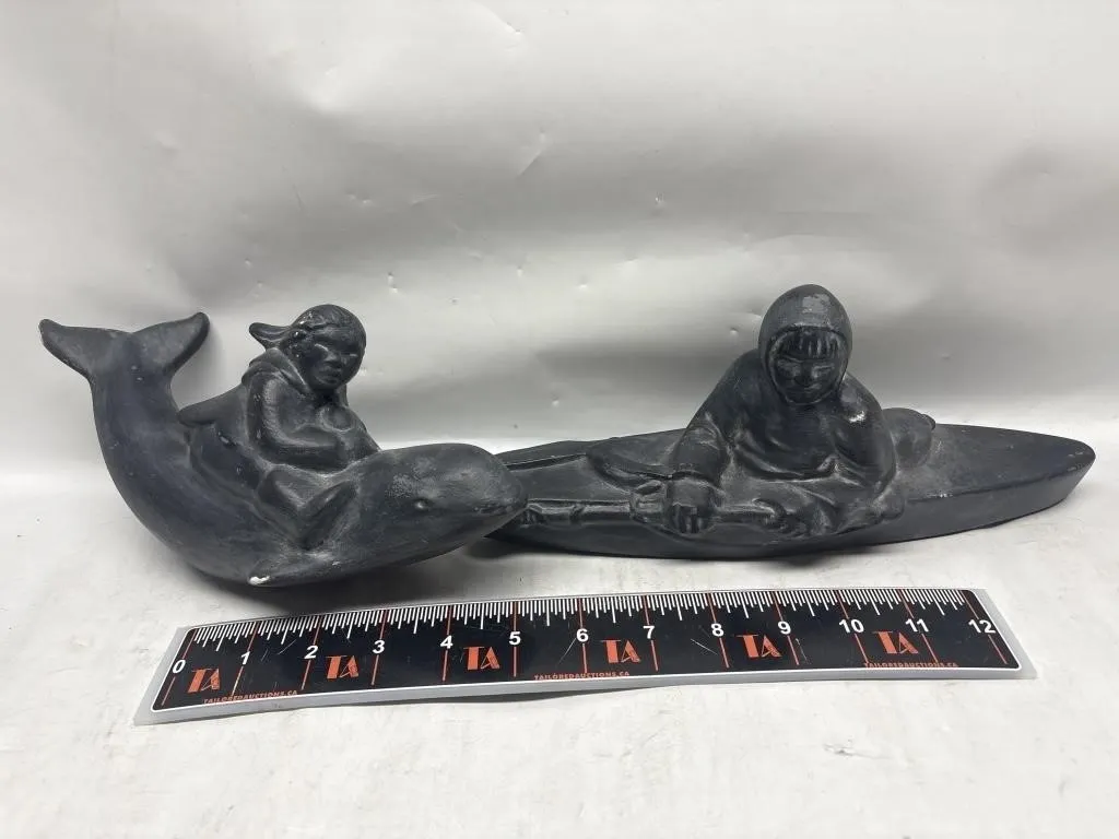Inuit soapstone carvings: figure on whale &