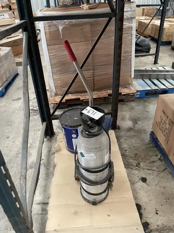 CO2 tank on cart, pail of Floor master sealant
