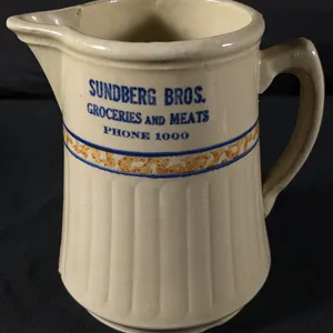 RED WING STONEWARE ADVERTISING SPONGEBAND GREYLINE PITCHER SUNDBERG BROS GROCERIES AND MEATS PHONE 1000 (RED WING MN)