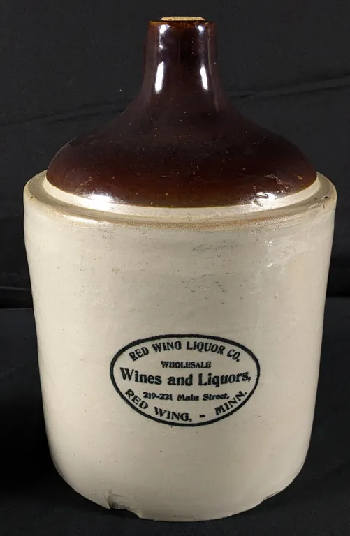 2 GAL RED WING STONEWARE ADVERTISING CROCK JUG RED WING LIQUOR CO WHOLESALE LIQUORS & WINES RED WING
