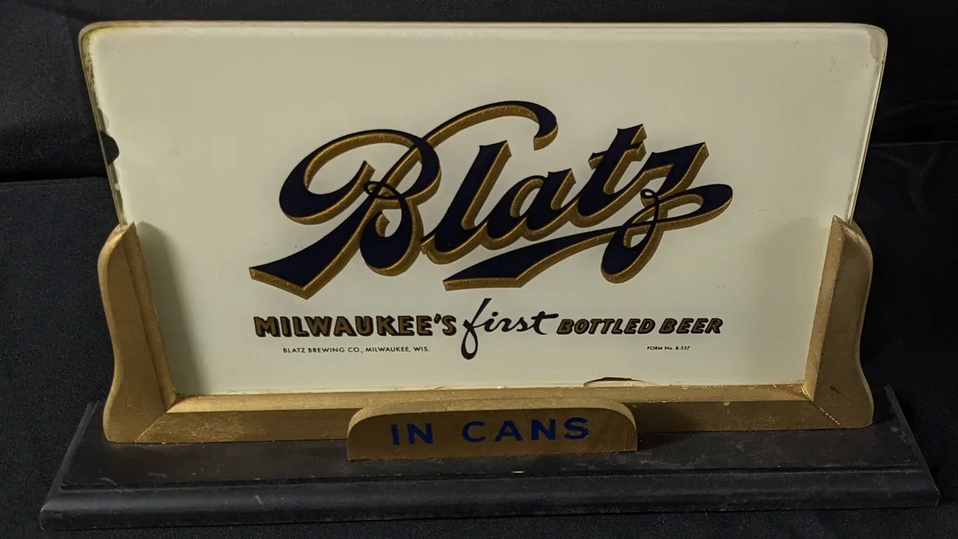 COUNTER-TOP GLASS SIGN BLATZ MILWAUKEE'S FIRST BOTTLED BEER IN CANS & BOTTLES