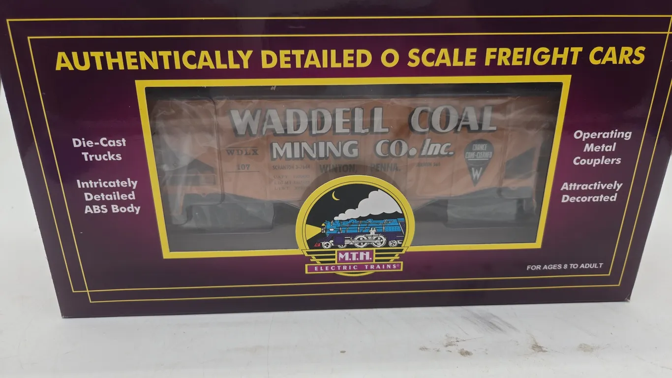 Vintage m t h brand wadell coal two bay.Fish belly hopper car with coal in original box