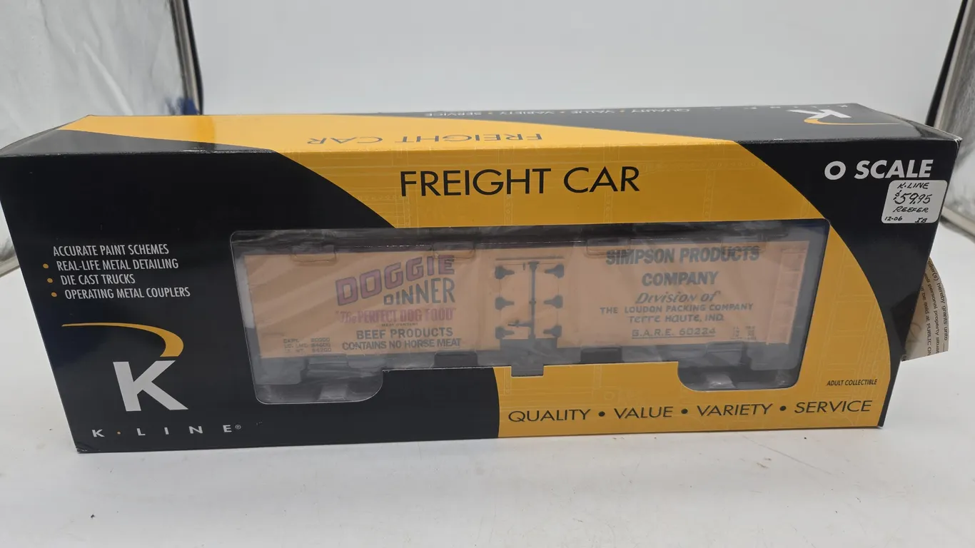 Vintage K line doggy, dinner woodsided reefer car in original box.