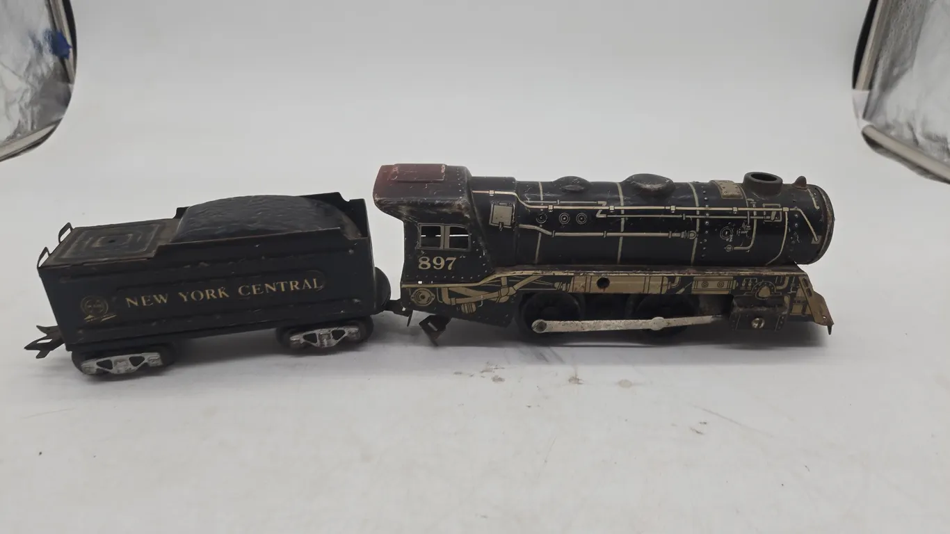 Vintage marxs brand number 897 diesel locomotive, with new york central tinder